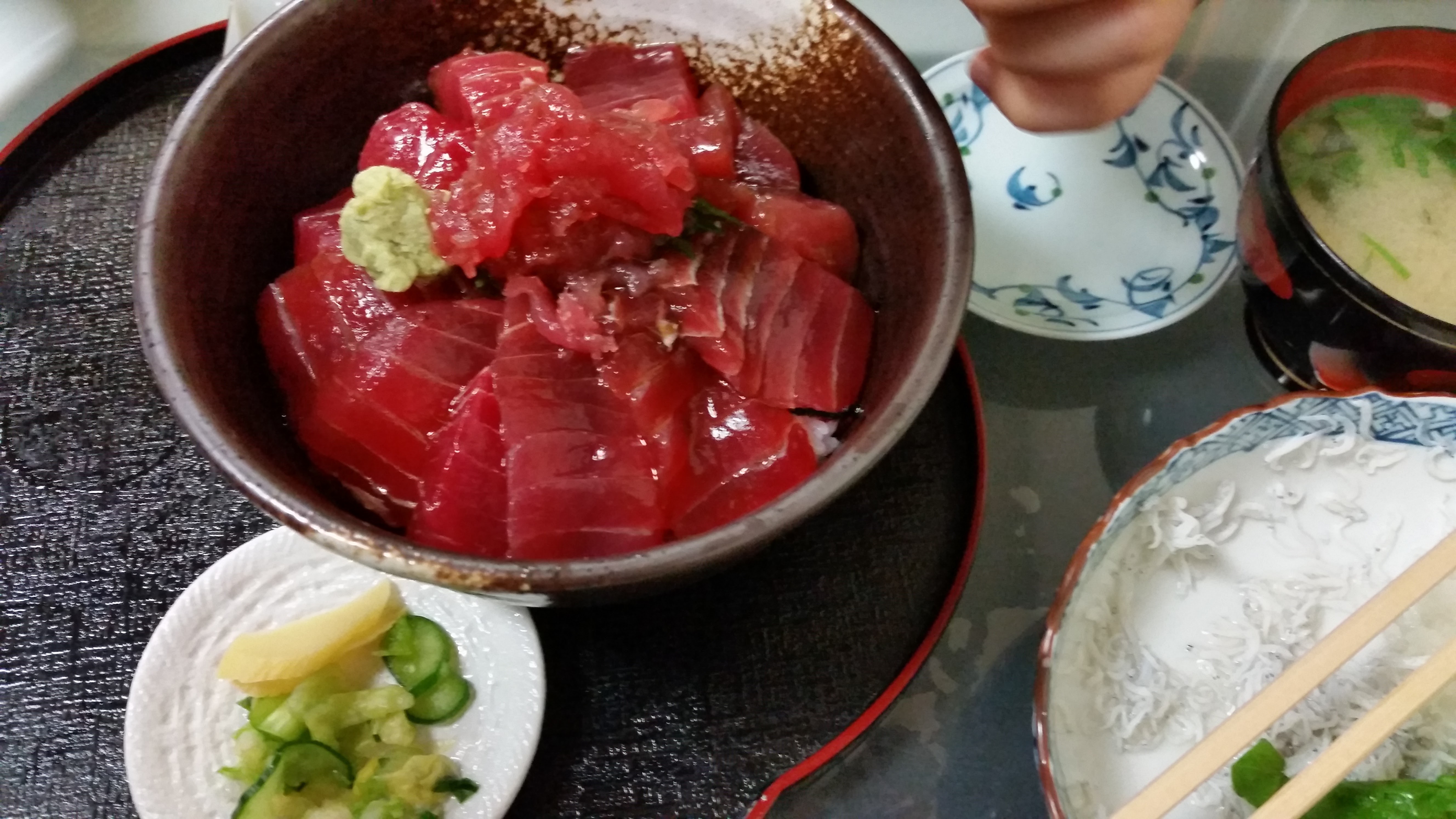 Maguro don with thick slices of raw tuna over rice, wasabi and Izu shirasu whitebait