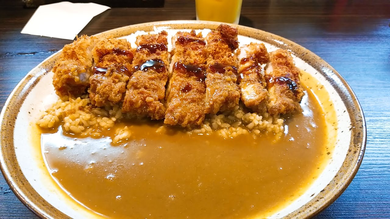Katsu curry: breaded pork cutlet on rice with Japanese curry sauce