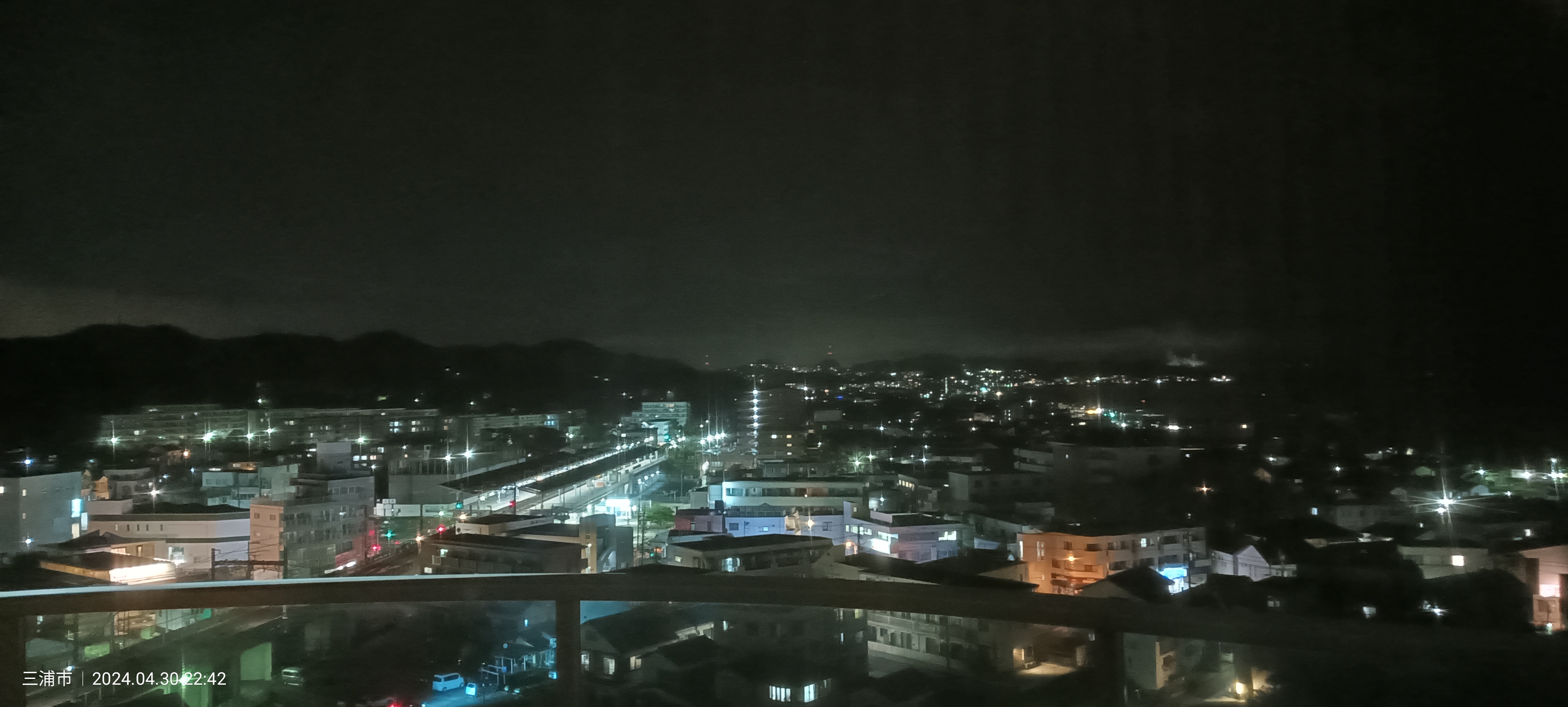 Night view of Miura from Mahoroba Minds: city lights and the main avenue illuminated, April 2024